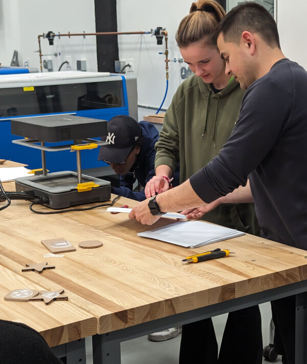 FirstBuild at CoCreate team members collaborating at the Thermoform