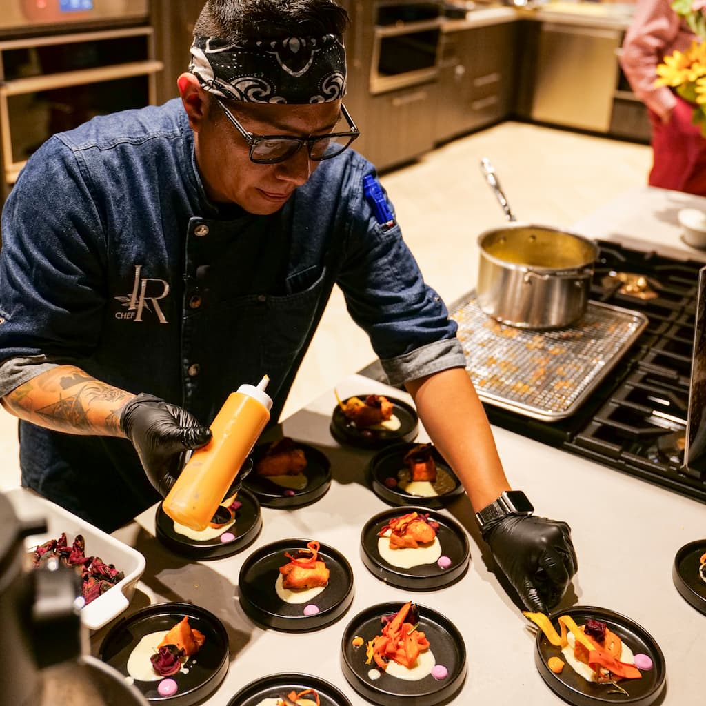 Chef Ivan preparing a course in CoCook